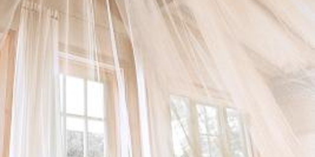 Jupiterimages/Comstock/Getty Images Use the same techniques to make a dream-catching canopy