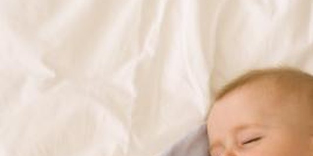 Jupiterimages/Pixland/Getty Images Careful daycare selection can help your baby nap well there.