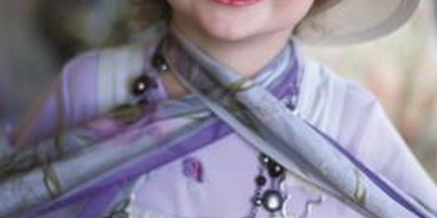 Photodisc/Photodisc/Getty Images Create a French fashion-inspired hat with your toddler.