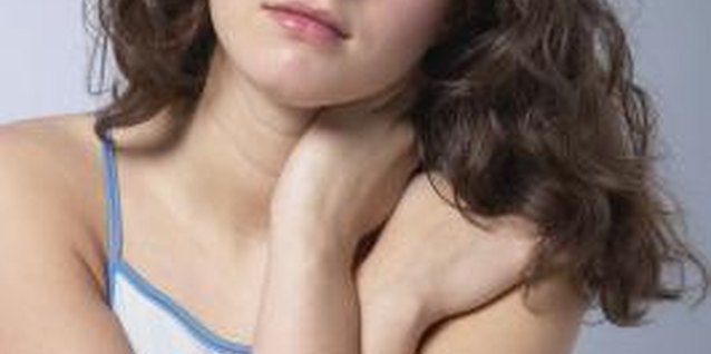 Hemera Technologies/AbleStock.com/Getty Images Your teen may appear moody, tired and depressed when she does not get adequate sleep.