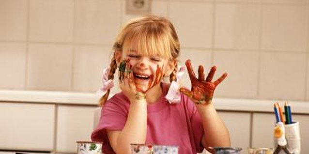 David De Lossy/Photodisc/Getty Images Finger painting can help your child learn.