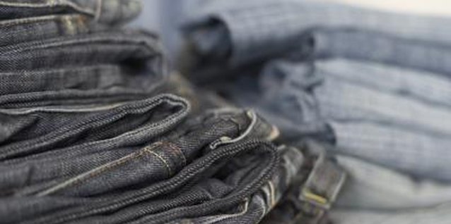 Jack Hollingsworth/Photodisc/Getty Images Upcycle different color denim jeans into a shag or rag rug.
