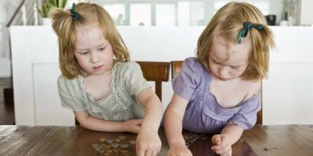 Jupiterimages/Goodshoot/Getty Images Improve your preschooler's counting skills during craft time.