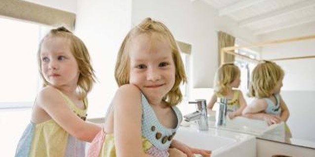 Jupiterimages/Goodshoot/Getty Images Toilet training times two.