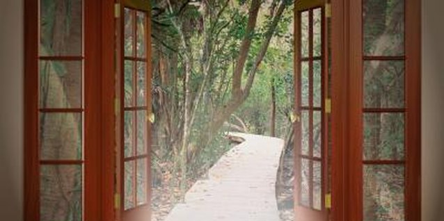 Comstock Images/Comstock/Getty Images When you restain the door jamb, you may want to restain the trim and door as well.