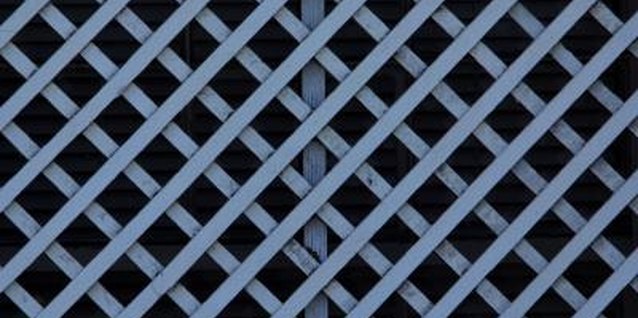 Hemera Technologies/AbleStock.com/Getty Images Adorn your lattice work after you paint it in a background color you choose.