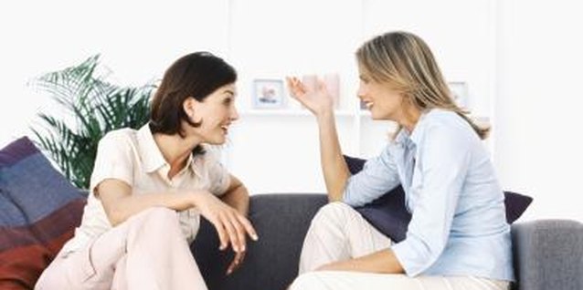 Stockbyte/Stockbyte/Getty Images Although you don't have to be best friends with your brother's girlfriend, try to find some things to like about her.