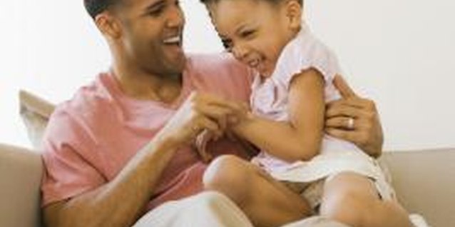 Jupiterimages/Creatas/Getty Images Dads want to give their daughters the world.