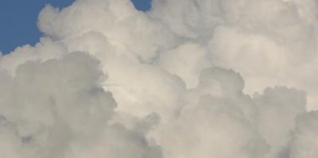 Jupiterimages/Photos.com/Getty Images Cumulus clouds are usually fat and puffy, and your little one will have fun making these out of cotton balls.