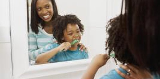 Jupiterimages/Brand X Pictures/Getty Images Young children usually adapt to household routines easily.