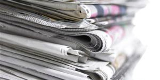 BananaStock/BananaStock/Getty Images Newspaper is a plentiful, workable medium for various craft decor projects.