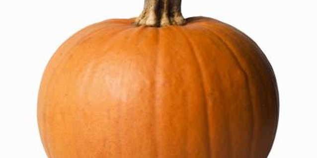 Stockbyte/Stockbyte/Getty Images Make a pumpkin centerpiece out of wire.