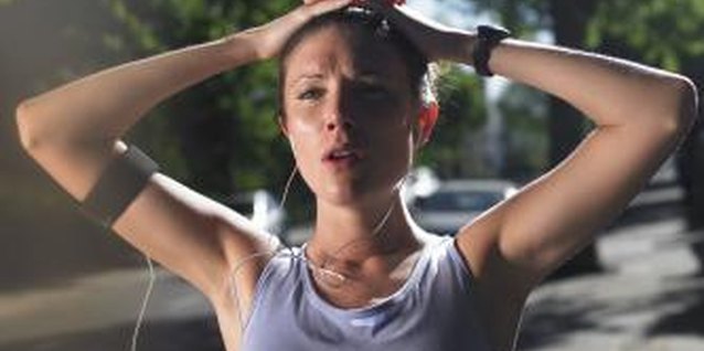 John Howard/Digital Vision/Getty Images Alternate sprints with jogging to burn fat fast.