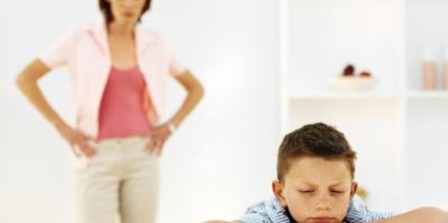 Stockbyte/Stockbyte/Getty Images Your child's self-esteem will suffer if you don't tame your negativity.