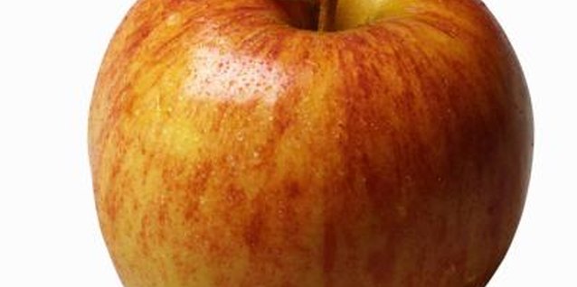 Stockbyte/Stockbyte/Getty Images "Graventstein" apples make excellent fresh fruit, and retain their flavor when baked or dried.