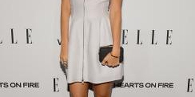 Michael Kovac/Getty Images Entertainment/Getty Images Nicole Richie's white A-line dress perfectly complements her petite frame.