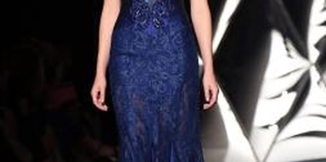 Elisabetta Villa/Getty Images Entertainment/Getty Images A long, lace dress in a dark color is a safe and chic option for formal events.
