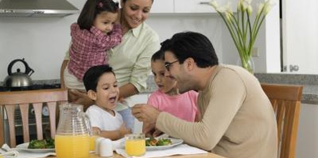 Medioimages/Photodisc/Photodisc/Getty Images Serving dinner goes faster with microwave cooking.