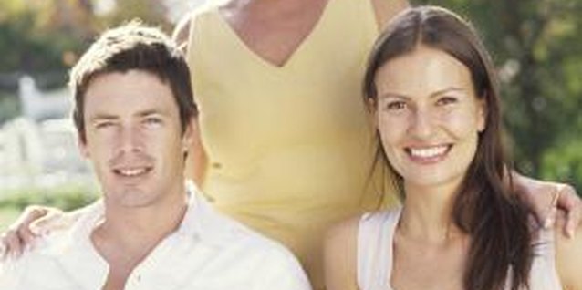 George Doyle/Stockbyte/Getty Images Help your mom and boyfriend become friends.