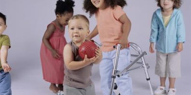 Amos Morgan/Photodisc/Getty Images Allowing her to help with chores will teach her that she is more than capable of helping out.