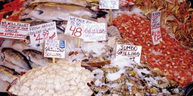 Medioimages/Photodisc/Photodisc/Getty Images Raw seafood can cause many different illnesses.