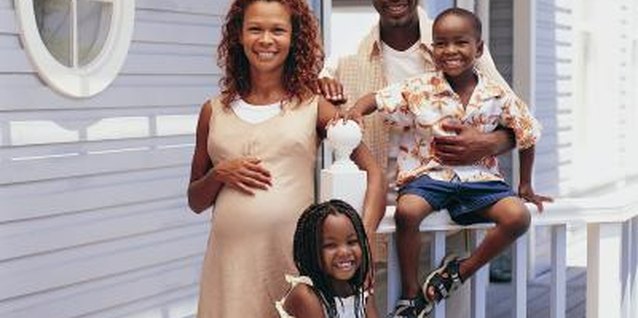 Digital Vision./Digital Vision/Getty Images Get the kids involved in your pregnancy announcement to their dad.