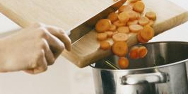 Digital Vision./Digital Vision/Getty Images Cook glazed carrots in one pot on the stovetop.