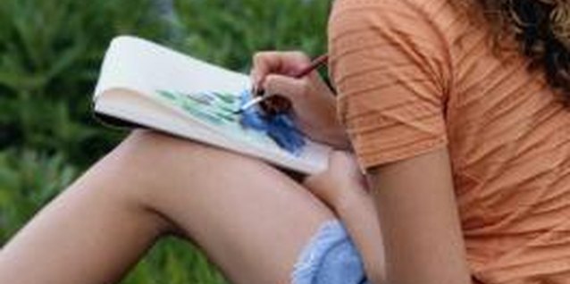 Steve Mason/Photodisc/Getty Images Creative activities improve a teen girl's self-esteem.
