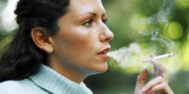 Stockbyte/Stockbyte/Getty Images Quit early enough to reverse the impact of smoking.