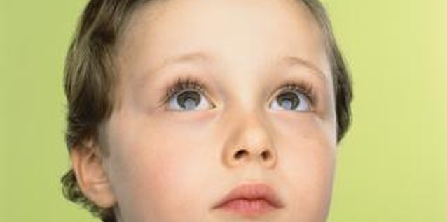 Digital Vision./Digital Vision/Getty Images Your child may be stimming when he stares off into space.