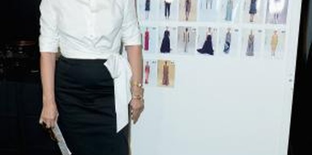 Michael Loccisano/Getty Images Entertainment/Getty Images Carolina Herrera pairs a black-and-white ensemble with muted accessories.