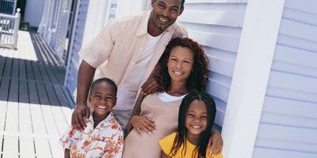 Digital Vision./Digital Vision/Getty Images Telling your children about a new baby can make the big change easier.