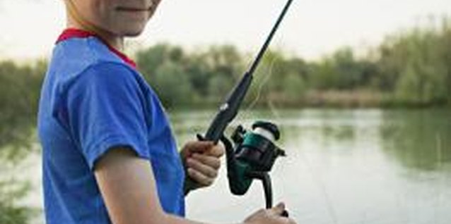 Photodisc/Photodisc/Getty Images Take your toddler fishing at one of Raleigh's state parks.