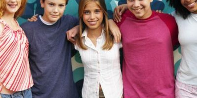 Stockbyte/Stockbyte/Getty Images Preteens and teens share similarities and differences.