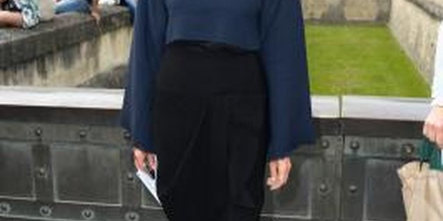 Pascal Le Segretain/Getty Images Entertainment/Getty Images Former fashion editor Carine Roitfeld wears a black skirt to a fashion event.