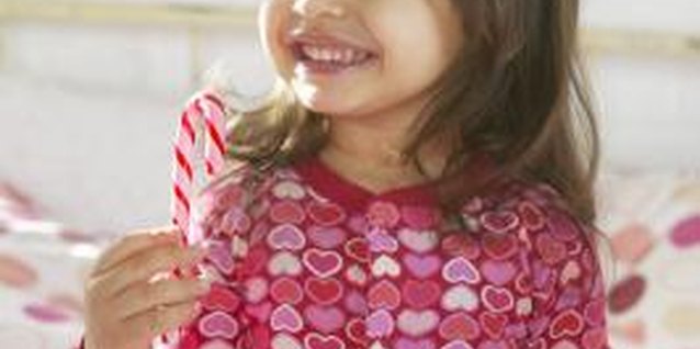 Digital Vision./Digital Vision/Getty Images Show your preschooler how to use candy canes for art projects.