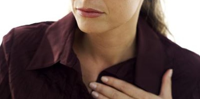Stockbyte/Stockbyte/Getty Images Acid reflux can cause unusual throat symptoms.