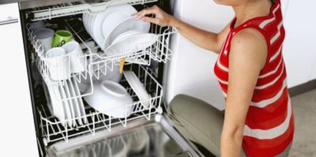 George Doyle/Stockbyte/Getty Images Clean dishwashers work more effectively.