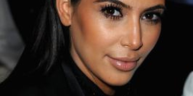 Pascal Le Segretain/Getty Images Entertainment/Getty Images Kim Kardashian sports sculpted eyebrows at the Givenchy Fall/Winter Ready-to-Wear show in Paris.