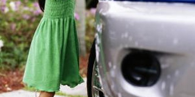 Kraig Scarbinsky/Digital Vision/Getty Images Little hands can help with big jobs.