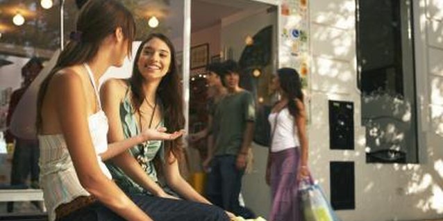 Maria Teijeiro/Digital Vision/Getty Images Teens can become preoccupied with shopping if they haven't developed other interests.