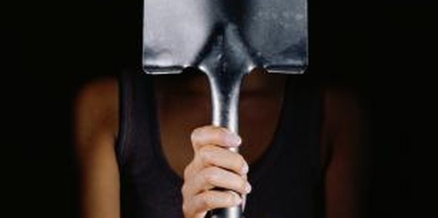 Ryan McVay/Lifesize/Getty Images A sharpened shovel make gardening chores easier.