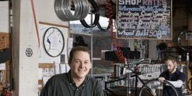 Thomas Northcut/Digital Vision/Getty Images Your local bike shop is a great place to get sized for your Cannondale frame.