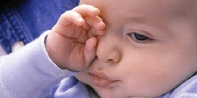 Dick Luria/Photodisc/Getty Images Your infant will let you know when she's sleepy.