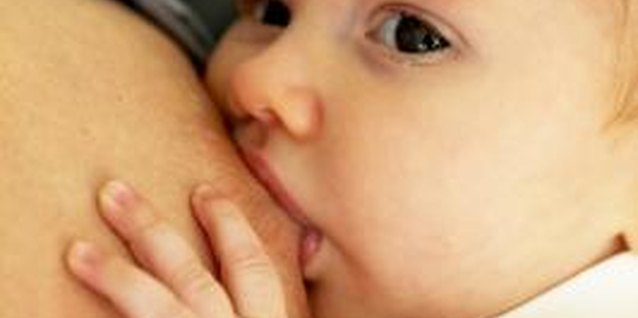 George Doyle/Stockbyte/Getty Images Syringe-feeding at the breast can help maintain your supply.