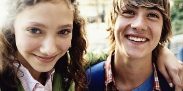 Digital Vision./Digital Vision/Getty Images Encouraging healthy friendships may improve your teen's attitude.
