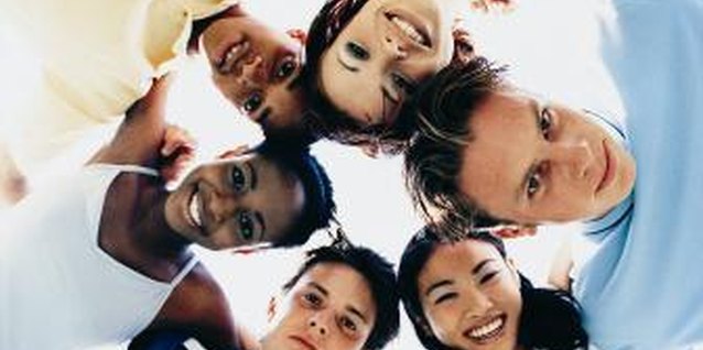 Stockbyte/Stockbyte/Getty Images Teach your teen to be accepting of people of all colors.