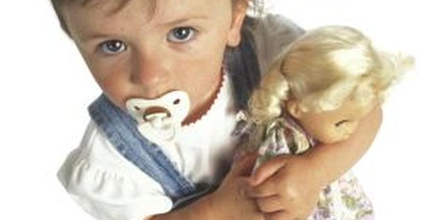 Photodisc/Valueline/Getty Images A toddler will stand her ground if she's feeling threatened.