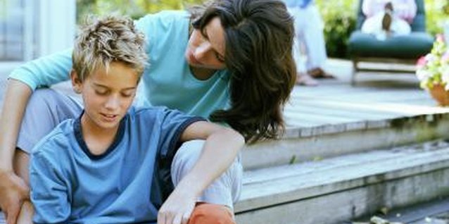 Digital Vision/Digital Vision/Getty Images Moms and sons share a special relationship, but discipline is important.