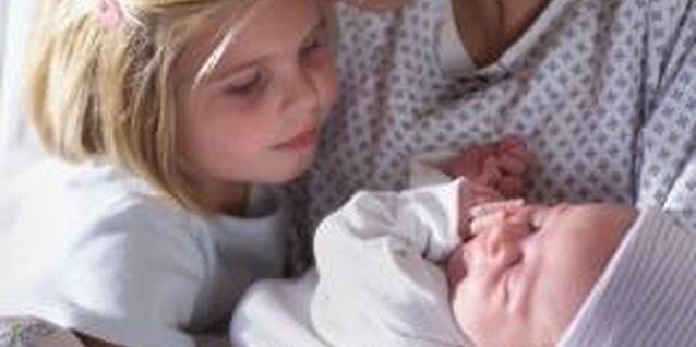 Photodisc/Photodisc/Getty Images Siblings can make presents that require minimal materials and supervision.